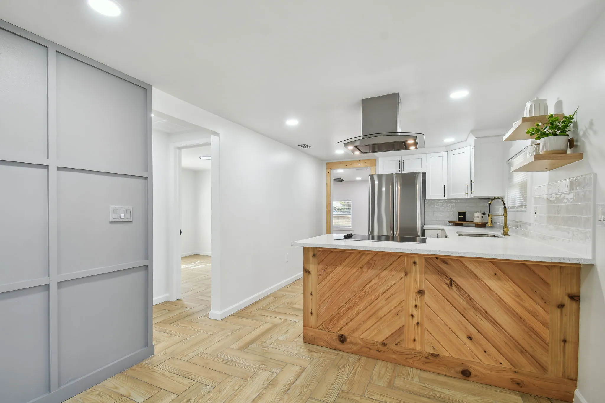 Spacious living room with feature wall